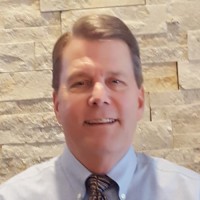 Neill Bassett, Mba