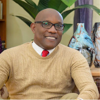 Dr. Philbert Aaron