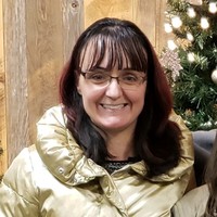 JULIE RIKER