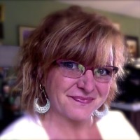 Lucia Bush,  LMSW