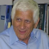 E George Kneider