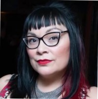 Elsa Zamora, L.E