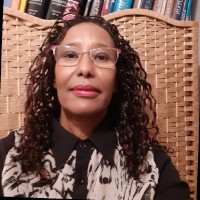 Kinsi Clarke  LLM, MA