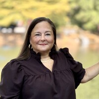 Cindy Strawn, Cap-Om