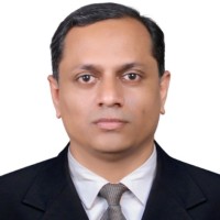 Manesh E.