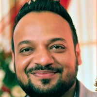 Naveen K.