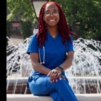 Asia K. Phillips, Mha