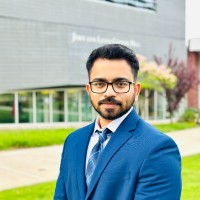 Nikhil E