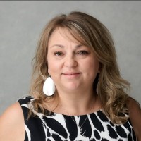 Trish Barrette Kron, Cem