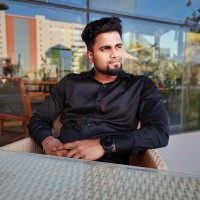 Surya R