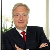 Alain Devos • FRICS