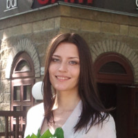 Elena Grishina, Acca