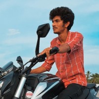 DHINESH K