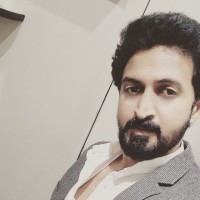 Krishna J