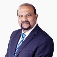 Mushtaq Sheikh JP DipRE AREINZ