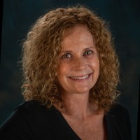 Amy G. Capo,  Broker/Owner