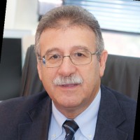 E. Kamitsos