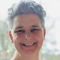 Sally Carr MBE (She/They)