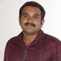 Dr. Roja Abraham Raju