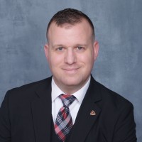 Robert Ahlers, C.P.M., DML