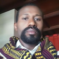 Ras John SHIMO
