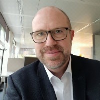 Dr. Henrik Simon