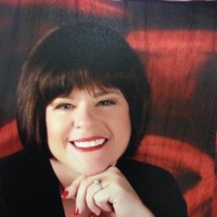 Julie Vaughn, Cap-Om