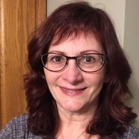 Annette M Magus