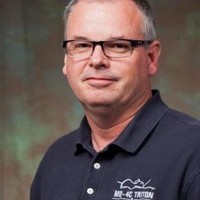 Scott E.