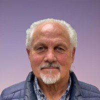 John Daniels B.A  Dip. Adv. Studies (Salford)