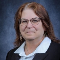 Carleen Muncy, Cap, Om, Acea