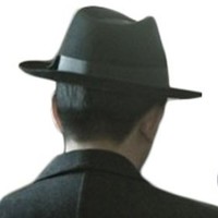 M C