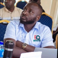 Kiiza John, PCQI