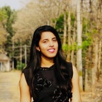 Rashmi M