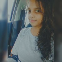 Nisha T