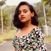 Sandhya M.