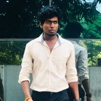 Ezhil E