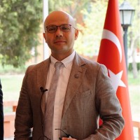 K. Emre Demir