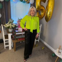 Tracey Holmes