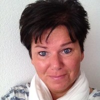 Corine H.