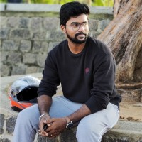 Naveen M