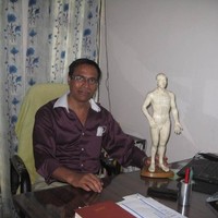 Dr. Amitava Banerjee, DMS, MD(AM), Dip.Acu. and YN.