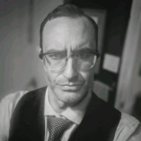 Gregory C.