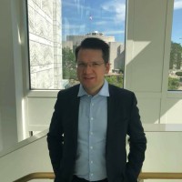 Dr Justin George