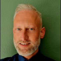 Mark E. De Jong