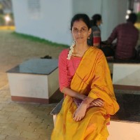 Asha T