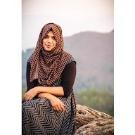 ANUSHA J
