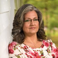 Angela E.