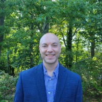 Alex Caliman, Cpa