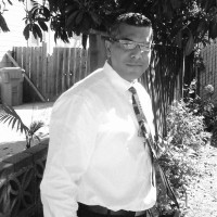 John M. Grisard
